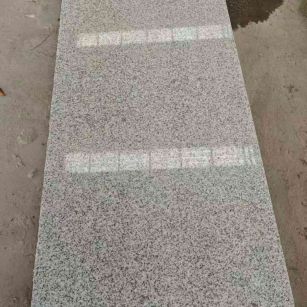 天水芝麻白光面毛板